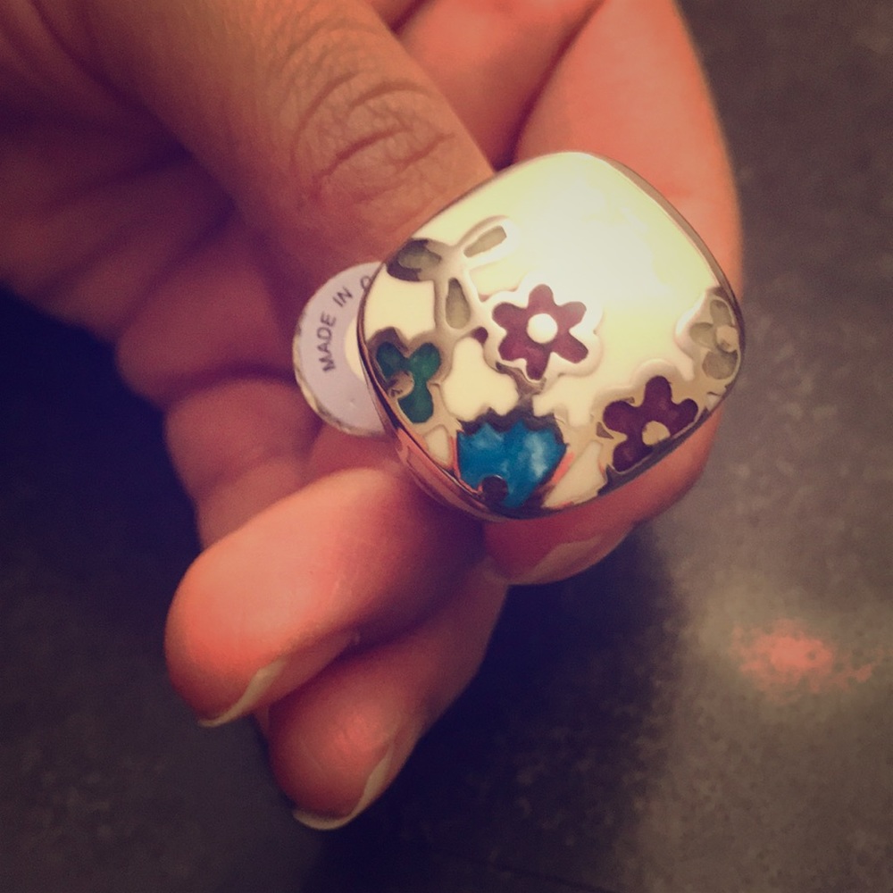 Size 9 stainless steel ring with flower design